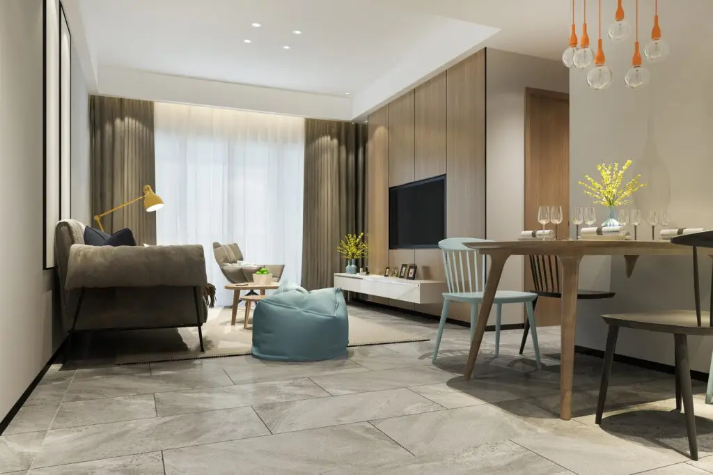Living space with sofa, TV, and dining table.